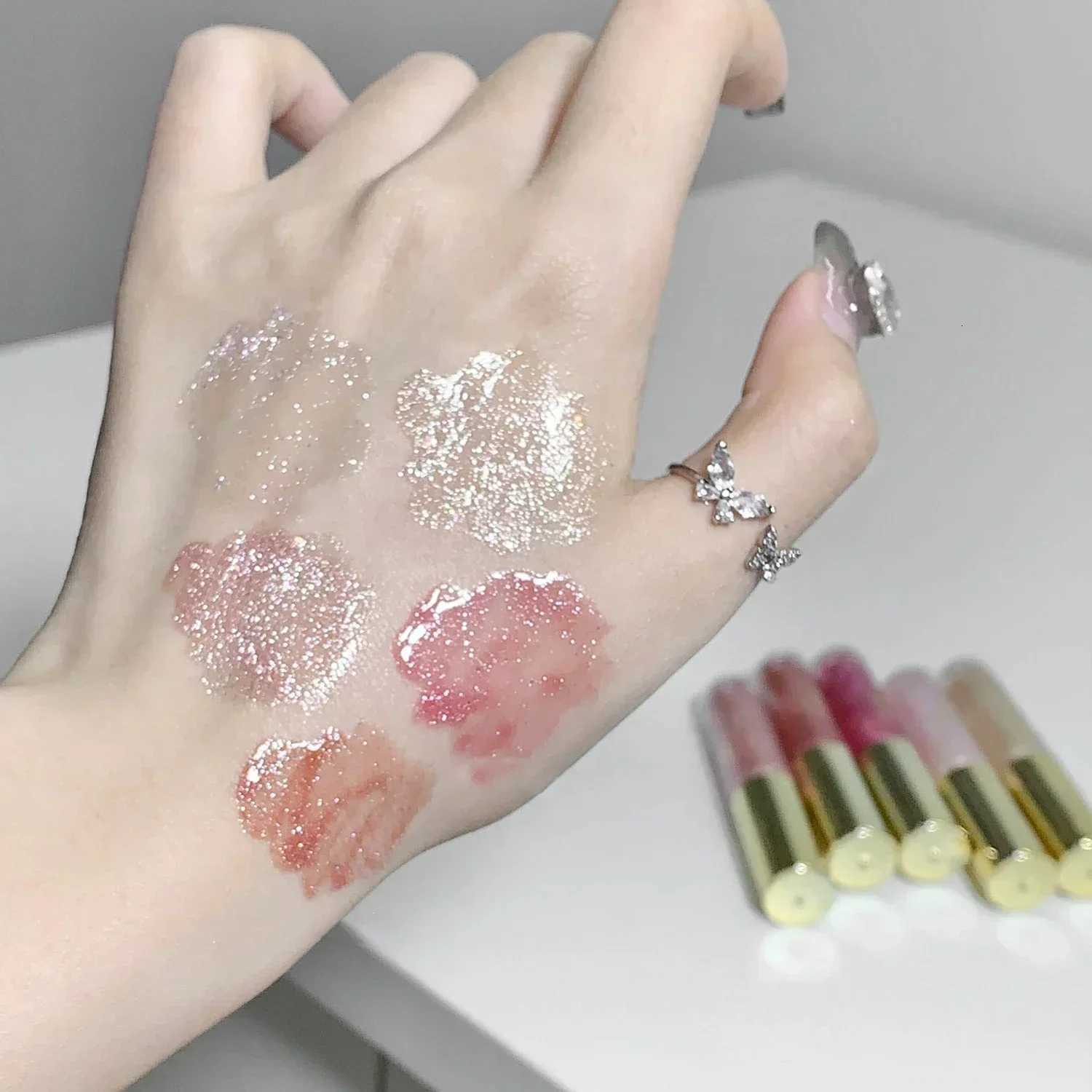 Mirror Pearl Glitter Lip Oil Long-lasting Moisturizing Plumping Gloss Lip Tint Makeup Sparkle Water Light Glaze Liquid LipsticksXJ250724