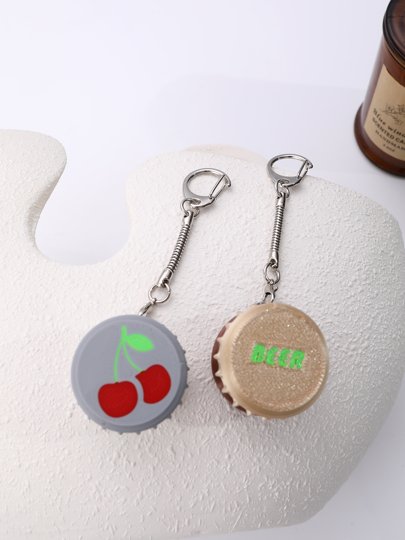 3D printed wine bottle cap keychain - adult stress relief toy, with a portable anxiety relief gadget featuring a clickable keyboard design