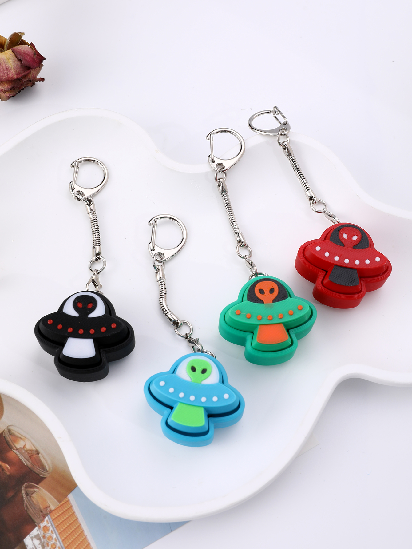 3D printed alien keychain - an adult stress relief toy with a portable anxiety-reducing gadget featuring a clickable keyboard design