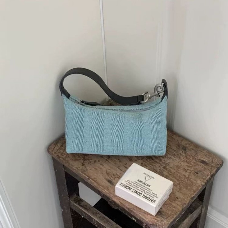 Urban Elegance Handbag Collection Featuring Merged Materials - Versatile Designer Fanny Pack