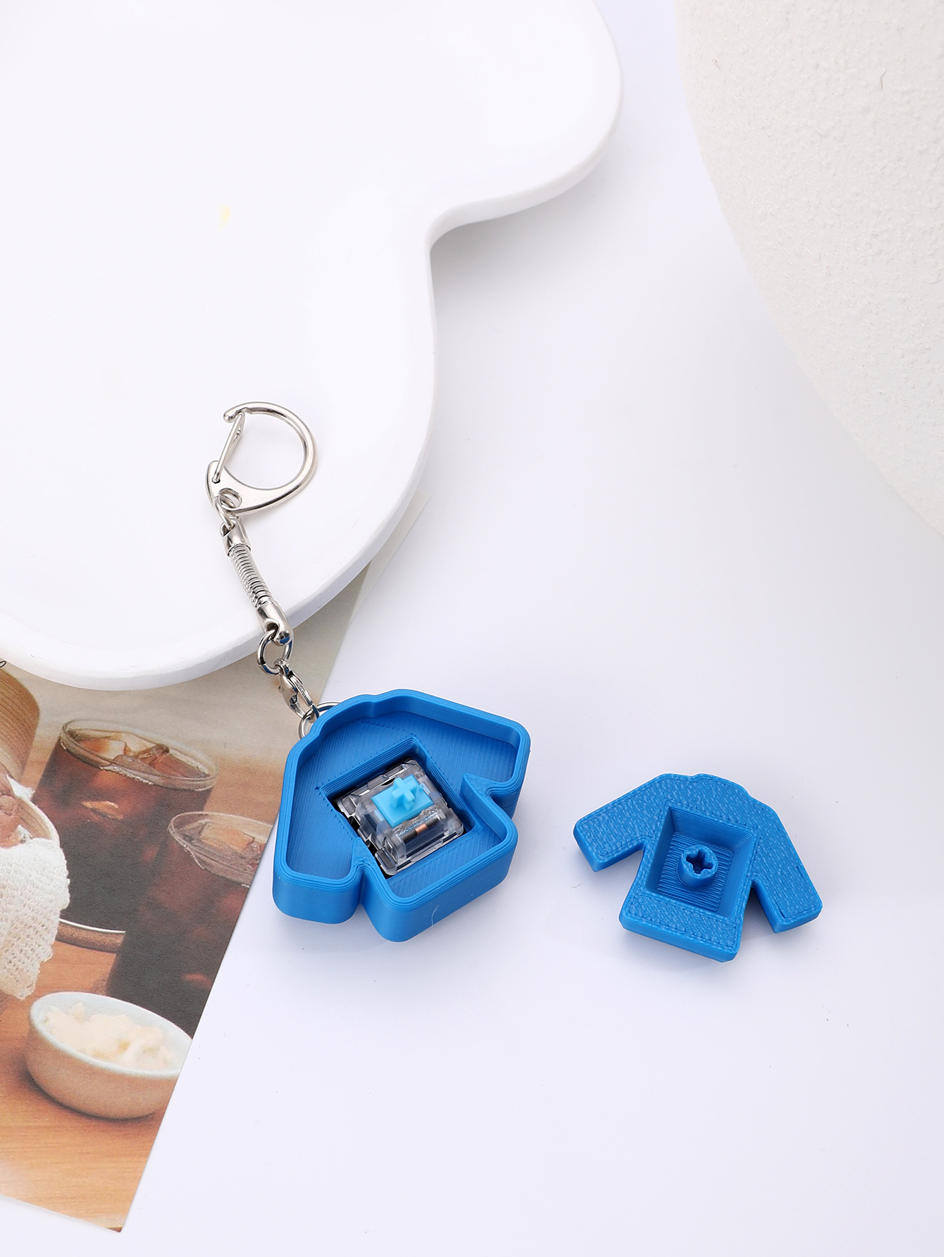 3D printed taekwondo uniform keychain - an adult stress relief toy with a portable anxiety-reducing gadget featuring a clickable keyboard design