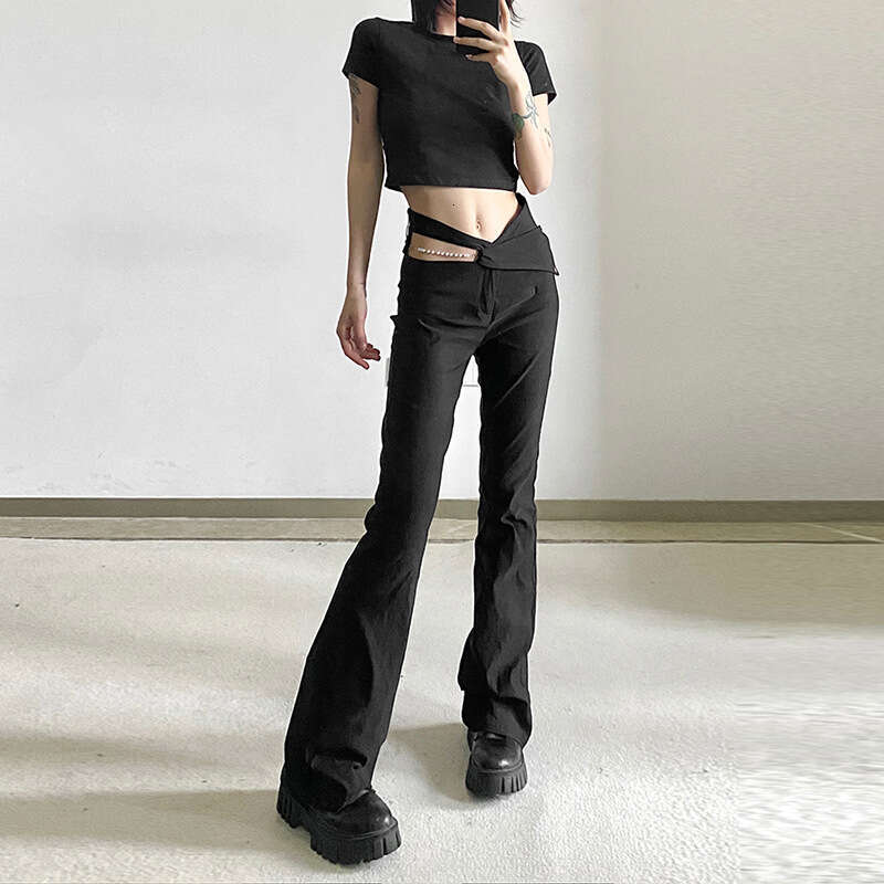 2022 Spring New Women's Fashion Solid Color Slim High Waist Fashionable Design Hollow Flared Pants a49