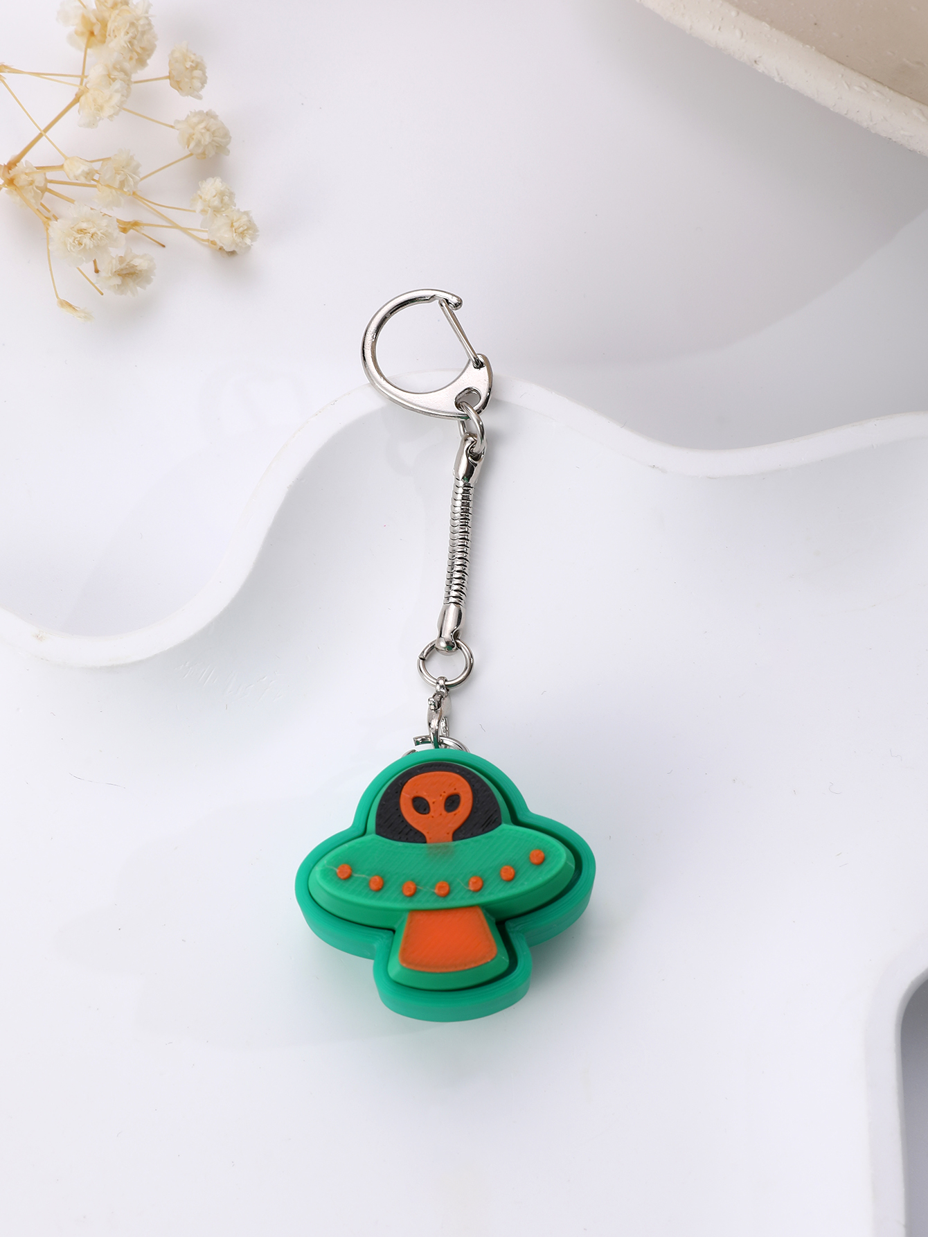 3D printed alien keychain - an adult stress relief toy with a portable anxiety-reducing gadget featuring a clickable keyboard design