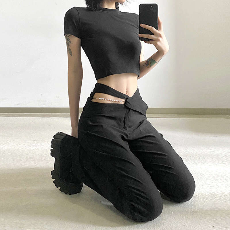 2022 Spring New Women's Fashion Solid Color Slim High Waist Fashionable Design Hollow Flared Pants a49
