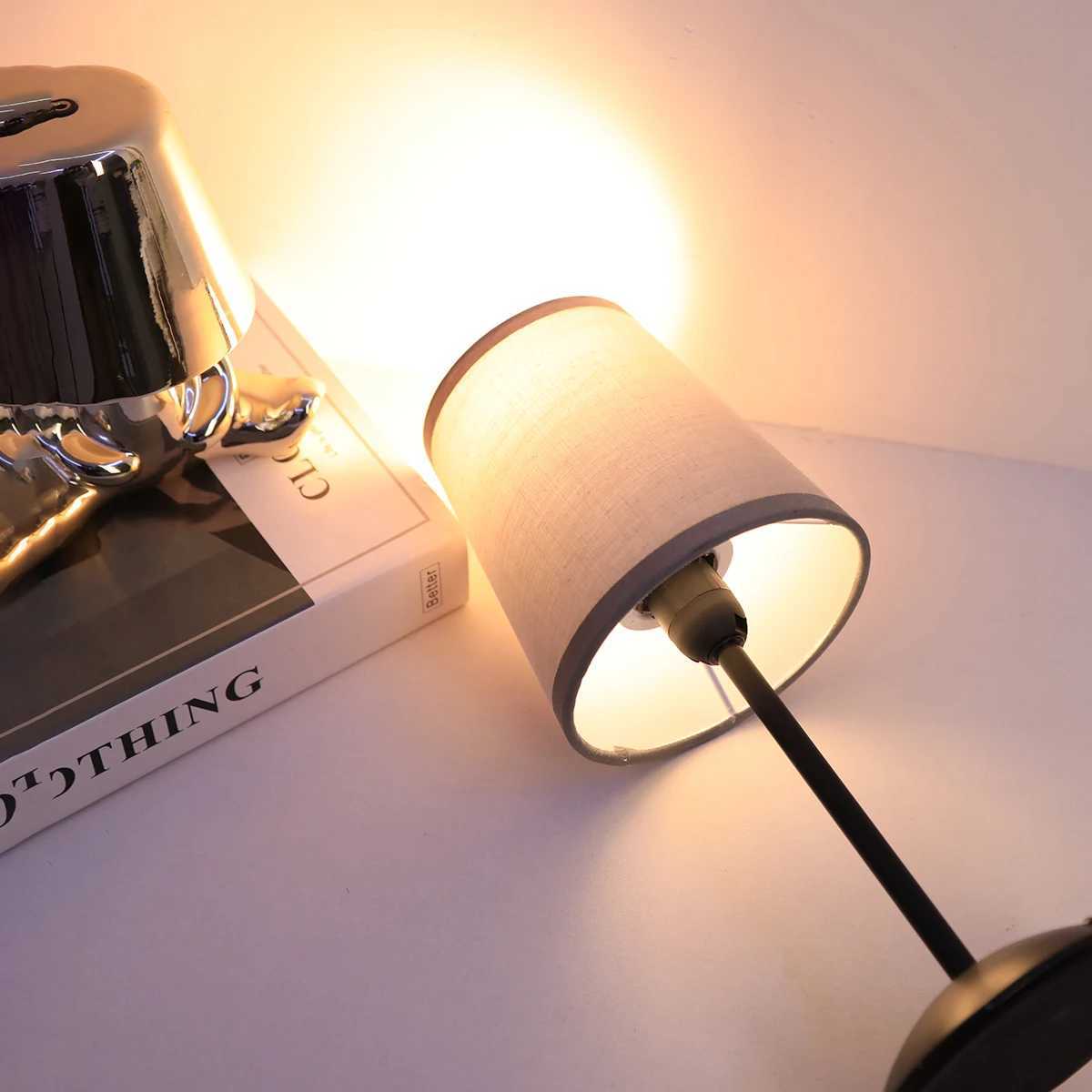 Modern minimalist and aesthetically pleasing fabric table lamp single color warm light LED home decoration lighting table lamp. XJ250725
