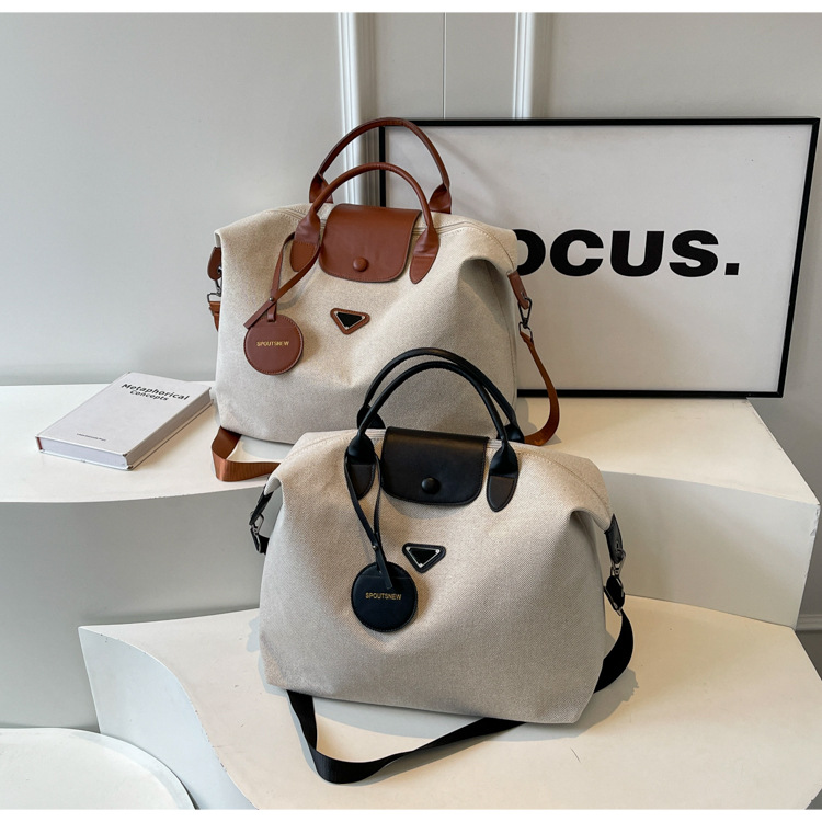 Large capacity lightweight travel bag new single shoulder commuting crossbody bag convenient hand luggage bag brown black
