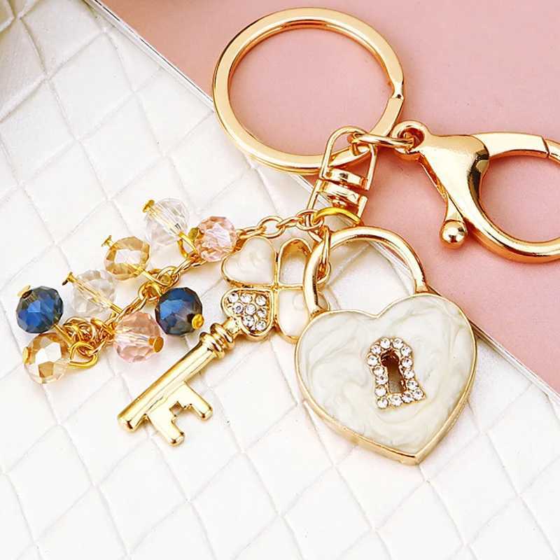 New Fashion Witnesses Rhinestone Bow Key Keychain With Dripping Lock Womens Birthday Gift Jewelry R250725