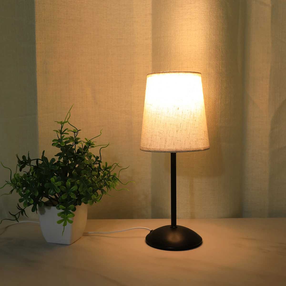 Modern minimalist and aesthetically pleasing fabric table lamp single color warm light LED home decoration lighting table lamp. XJ250725
