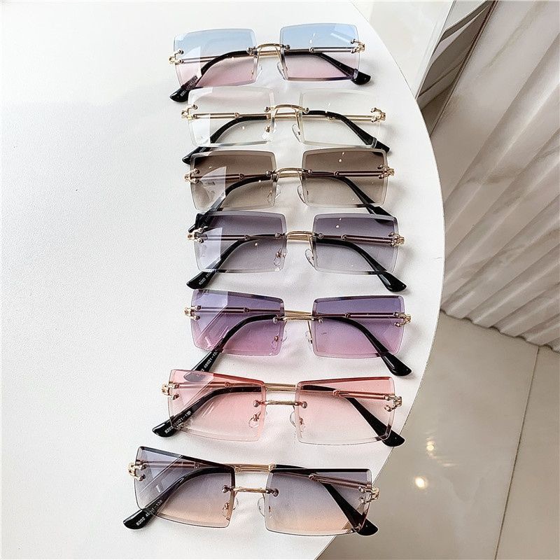 2025 European and American new cross-border square frameless cut-edge metal sunglasses women's gradient sunglasses trend glasses