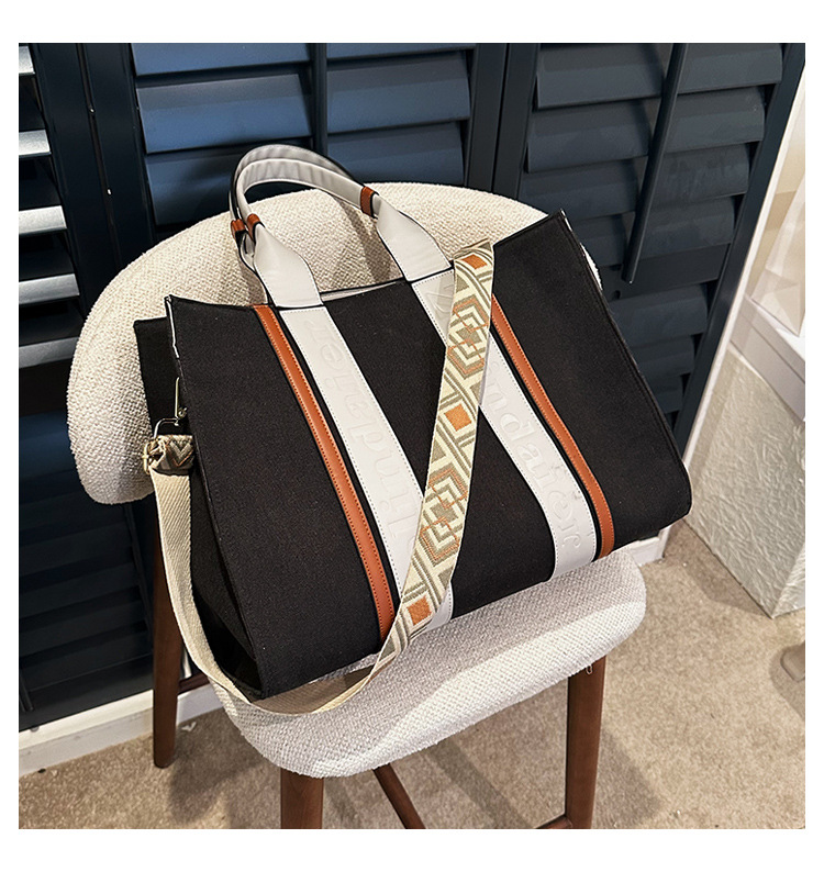 Large capacity hand-held canvas women's simple commuter tote with wide shoulder strap one-shoulder crossbody bag is versatile2025 TUES