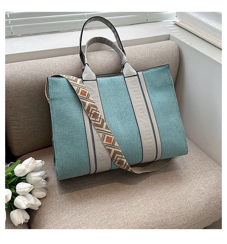 Large capacity hand-held canvas women's simple commuter tote with wide shoulder strap one-shoulder crossbody bag is versatile2025 TUES