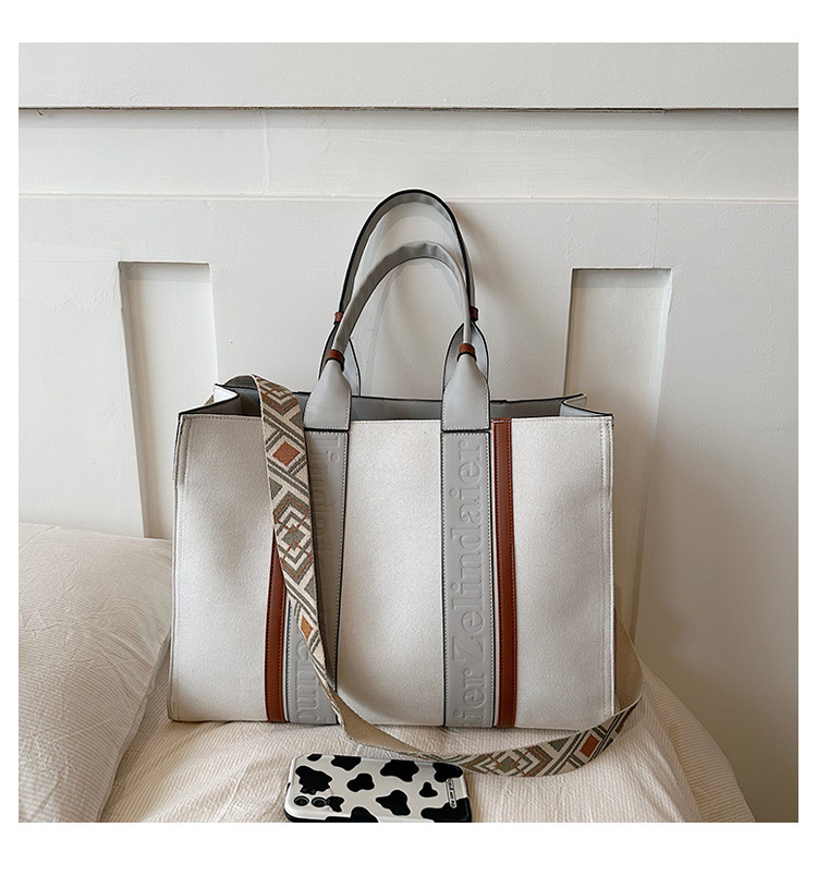 Large capacity hand-held canvas women's simple commuter tote with wide shoulder strap one-shoulder crossbody bag is versatile2025 TUES