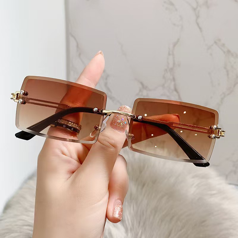 2025 European and American new cross-border square frameless cut-edge metal sunglasses women's gradient sunglasses trend glasses