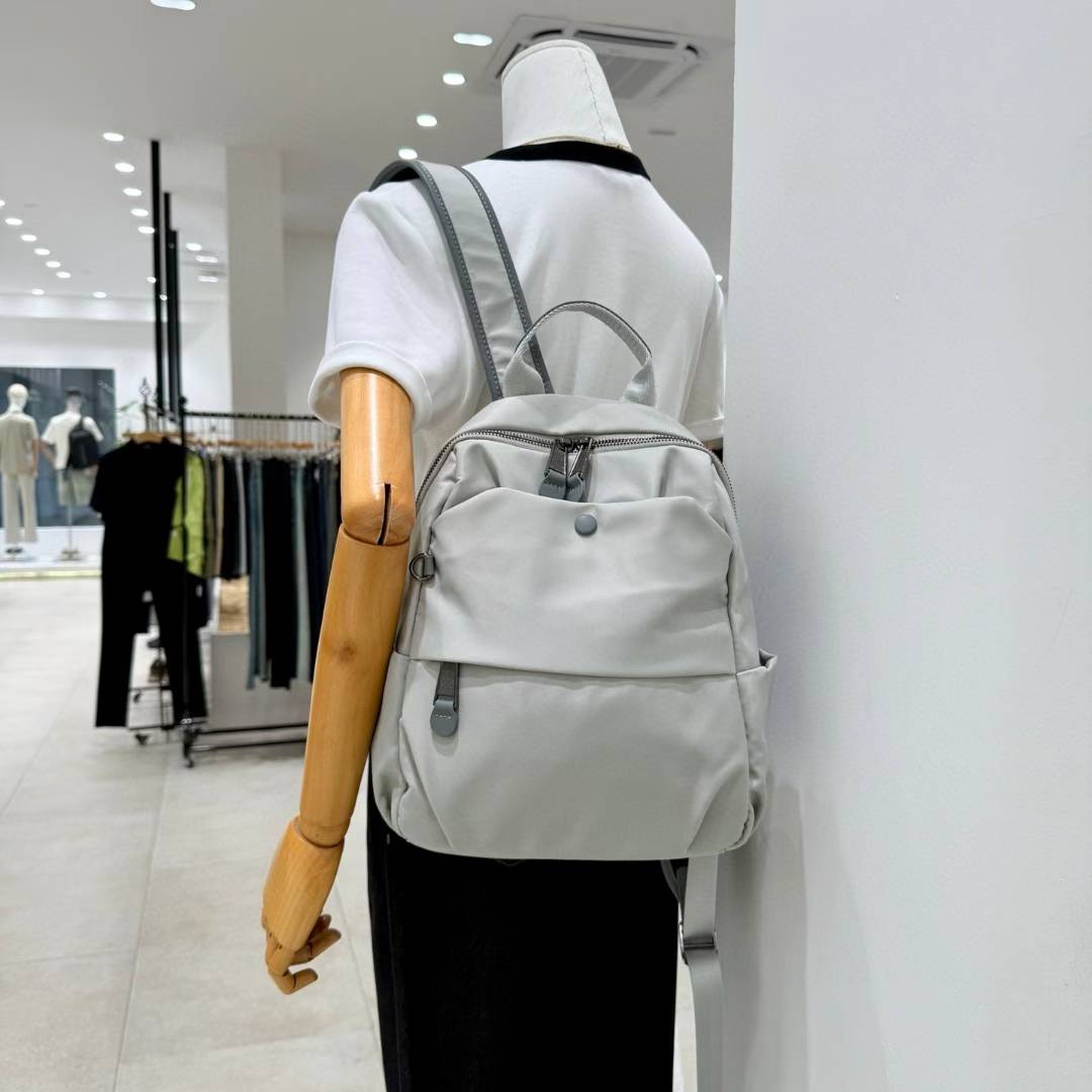 KOUDI 7085 Medium Backpack Women Lightweight High Quality Large Capacity Commuter Fashion Environmentally Friendly PU