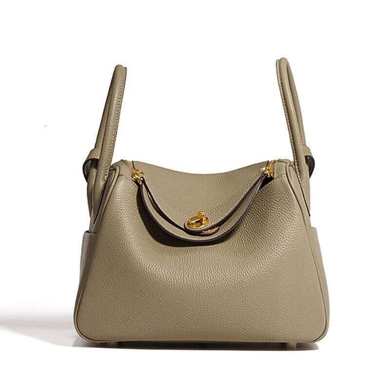 2025 Fashion Designer Handbag Genuine Cow Leather Ladies Party New Tote Adjustable Long Handle Underarm Bag MDNG