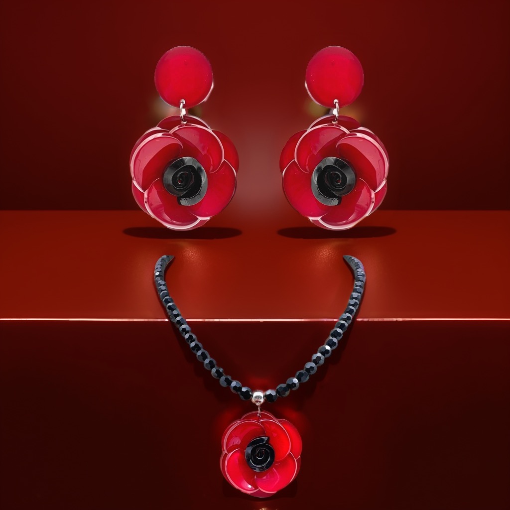 Elegant Black Beaded Necklace Featuring a Stunning Red Flower Charm