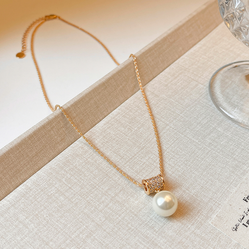 French golden waist full diamond Imitation pearl necklace with feminine charm, exquisite and niche design, high-end sweater chain accessory