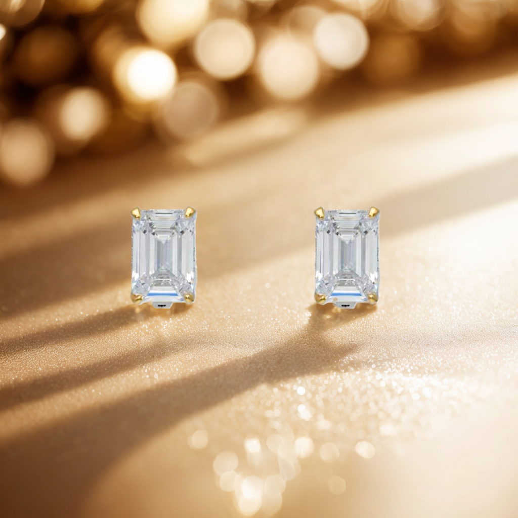 Luxurious square studs with shiny geometric cuts and contrasting gold claws