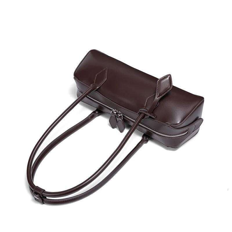 French retro solid color hand-held baguette niche leisure commuting multifunctional pillow bag, long handled sausage bag