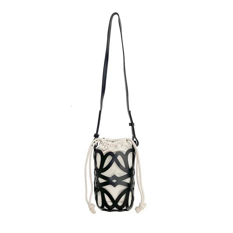 Hollowed Out Drawstring Bucket Bag Korea 2025 New Womens PU Splicing Canvas Shoulder Bag Fashion Versatile Mini Beach Bag