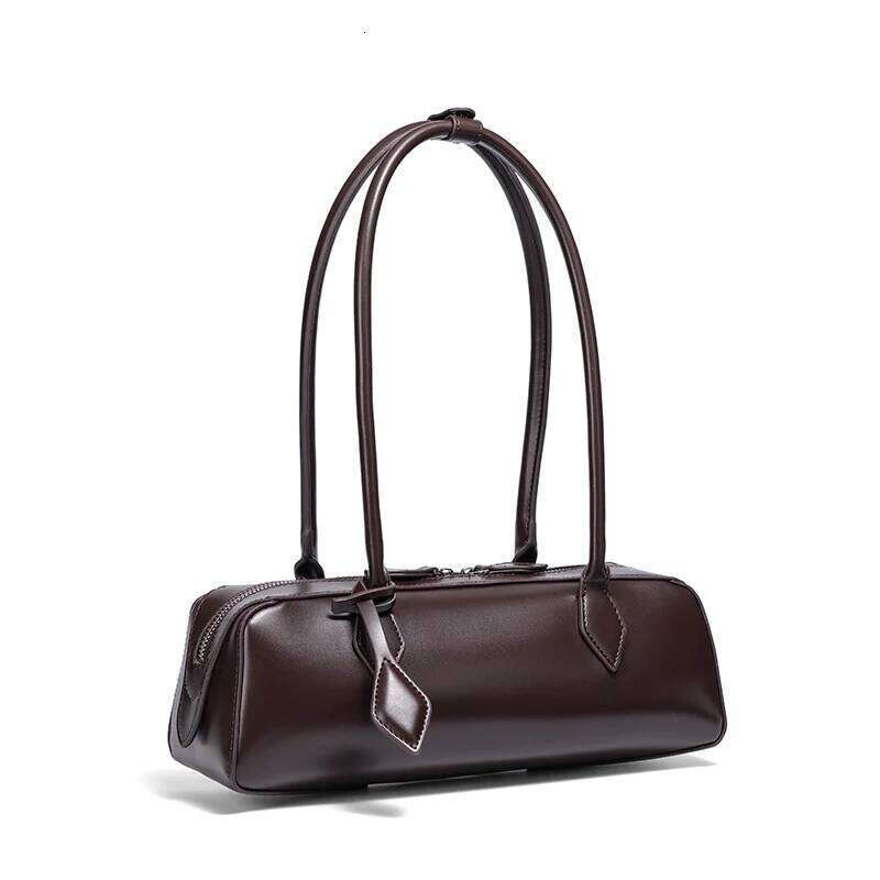 French retro solid color hand-held baguette niche leisure commuting multifunctional pillow bag, long handled sausage bag