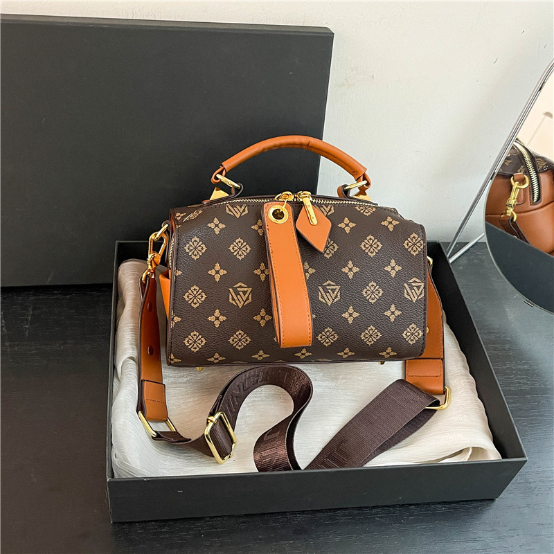 Casual bag female new niche retro fashion Boston pillow handbag cross-body