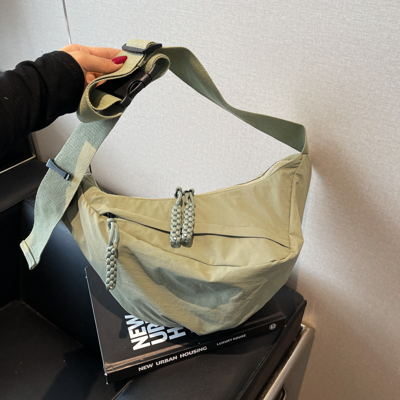 2025 Designer's New Women's Crossbody Bag Fashion Sports Dumpling Bag Outdoor Shoulder Bag