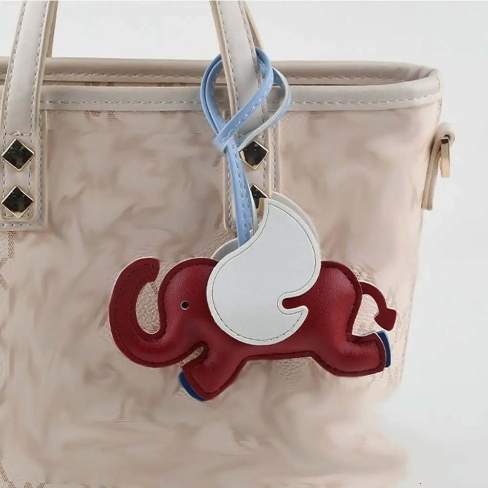 PU Leather Flying Wings Elephant Keychain Cute Cartoon Animal Hanger Car 16 Colors Bag Pendant for Women 250728