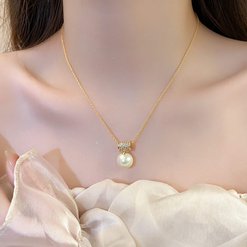 French golden waist full diamond Imitation pearl necklace with feminine charm, exquisite and niche design, high-end sweater chain accessory