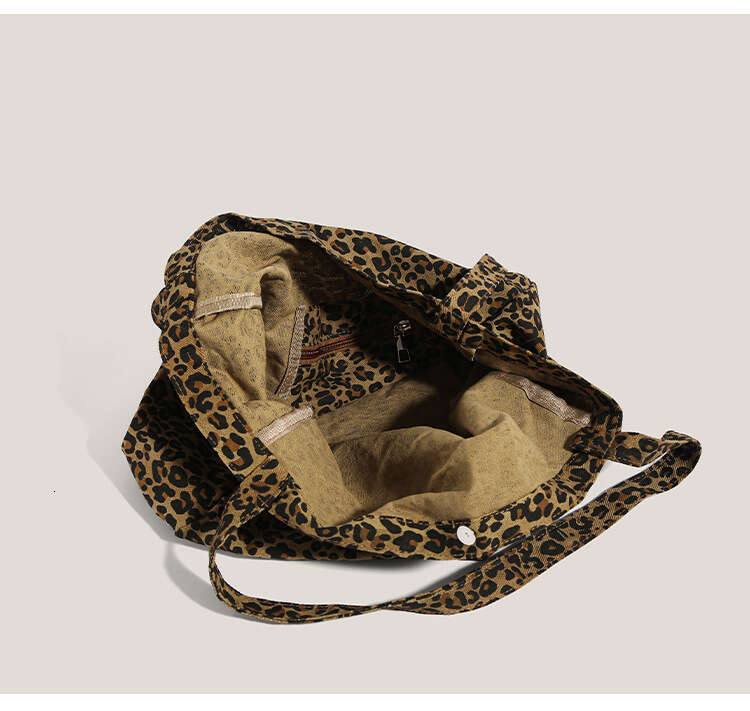 Niche Leopard Print Canvas for Women 2025 New Trend Lazy Style Shoulder Large Capacity Shopping Commuter Tote Bag