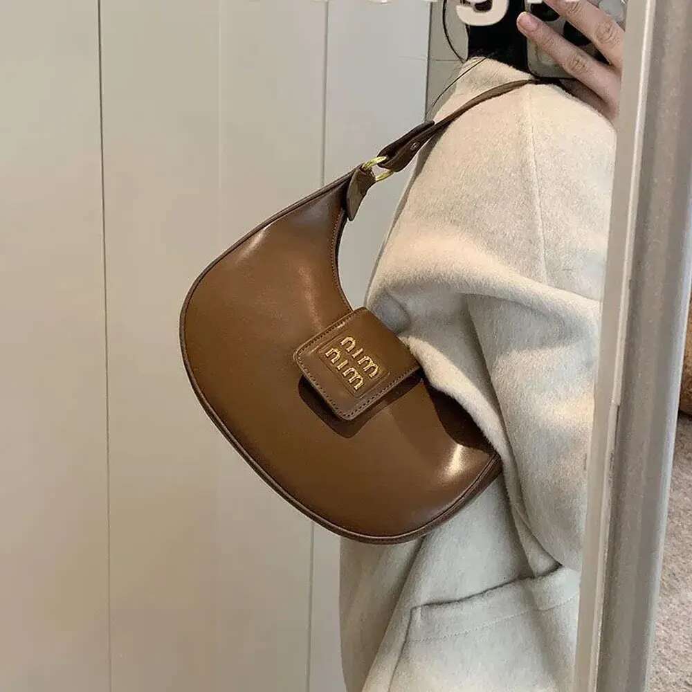Designer 2025 Shoulder High Quality Women's handbag Purse Leather Metal badge Hobo Crossbody Black Classic Underarm Bag Shopping bag