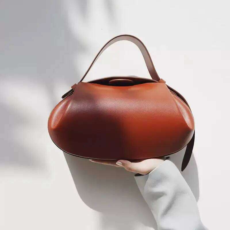 2025 Trendy Women PU Leather Adjustable Handle Handbags Designer Rugby Shape Vintage Shoulder New Design Underarm Bag