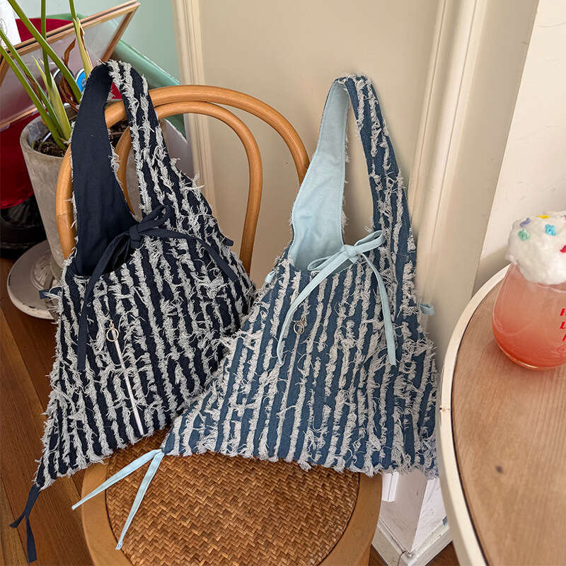 Spring New Dark Light Blue Striped Tassel Denim Fashion Versatile Design Sense Shoulder Bag for Work Commute