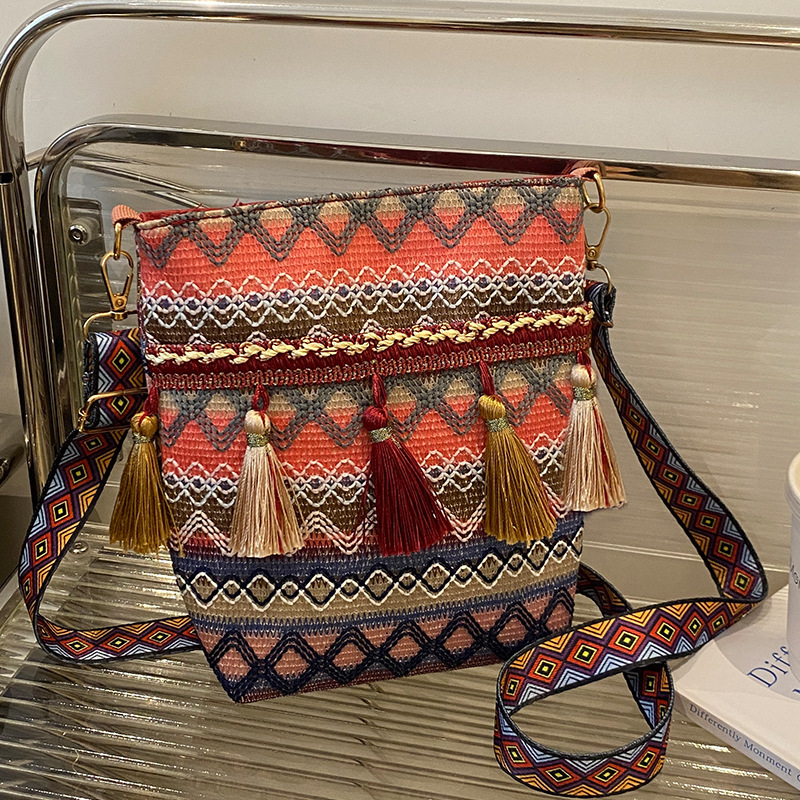 Large fashion capacity ethnic style bag tassel single shoulder bucket bag designer bag retro commuting crossbody bag women s handbag