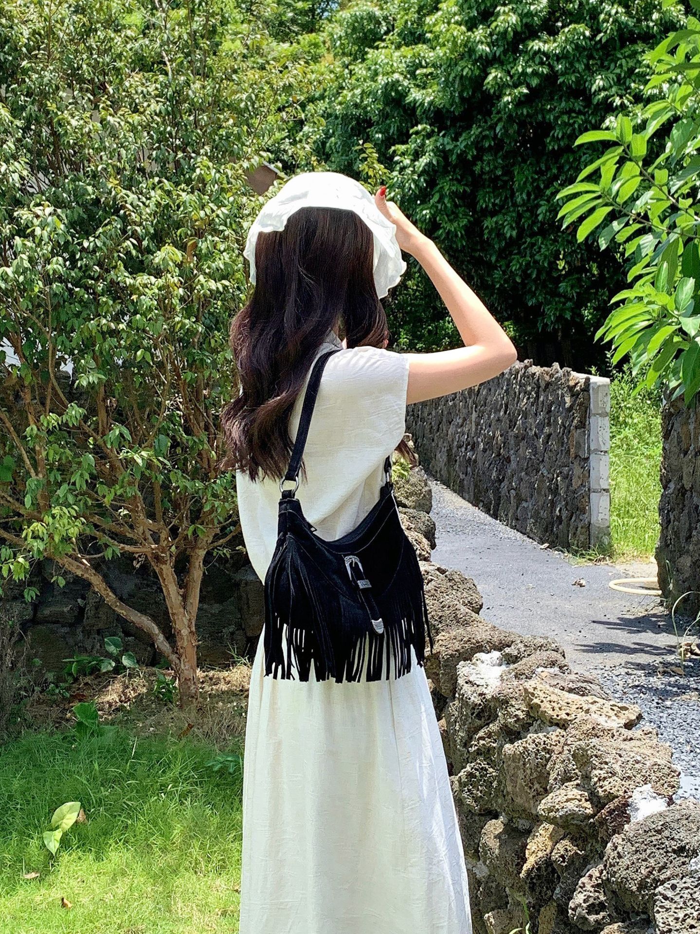 2025 Designer Women's Tassel Bag Retro Multi functional New Single Shoulder Crossbody Bag