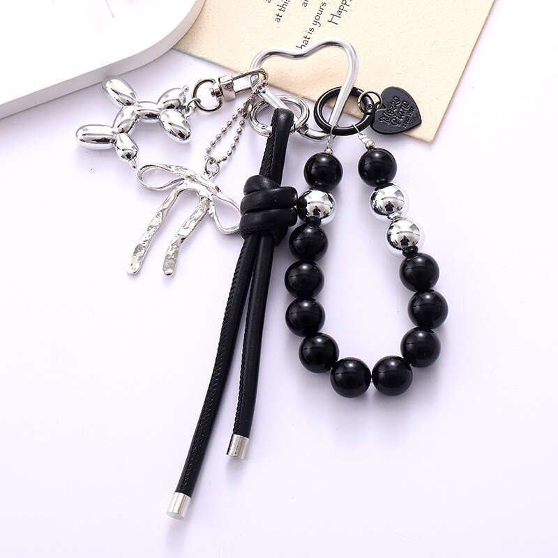New Ins Acrylic Bird's Nest Beaded Phone Pendant Fashionable High-end PU Leather Rope Bowknot Hanging Decoration