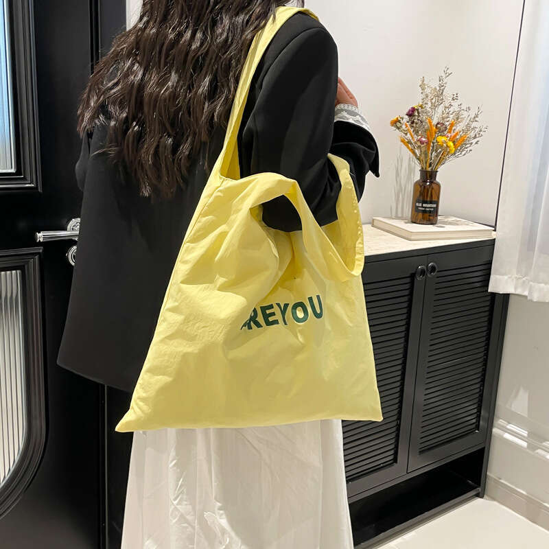 New Niche Alphabet Print Shoulder Large Capacity Designer Versatile Canvas Bag for Women Trendy Shopping Tote