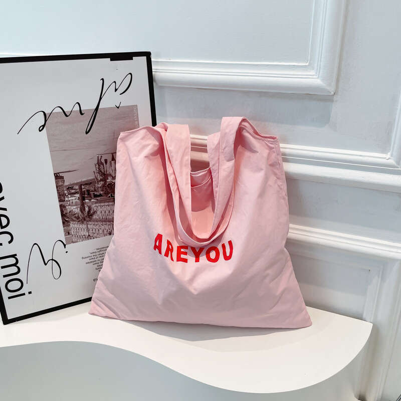 New Niche Alphabet Print Shoulder Large Capacity Designer Versatile Canvas Bag for Women Trendy Shopping Tote