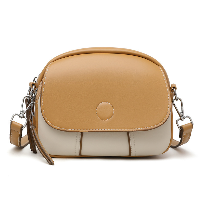 2025 designer's new niche design crossbody bag, mini round shoulder bag, fashionable women's bag