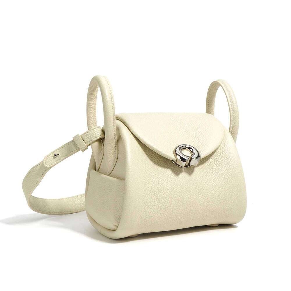 Luxury designer niche leather cute shoulder niche new summer women green shoulder handbag