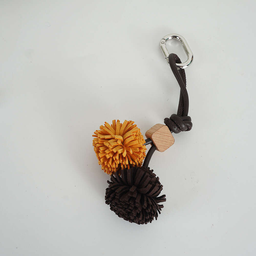 Miu Series Shoe Accessories High-End Mini Leather Handmade Woven Tassel Ball Keychain Bag Pendant