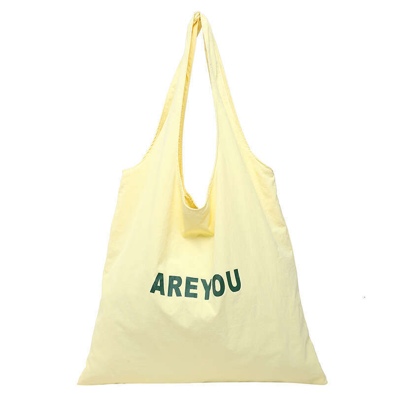 New Niche Alphabet Print Shoulder Large Capacity Designer Versatile Canvas Bag for Women Trendy Shopping Tote