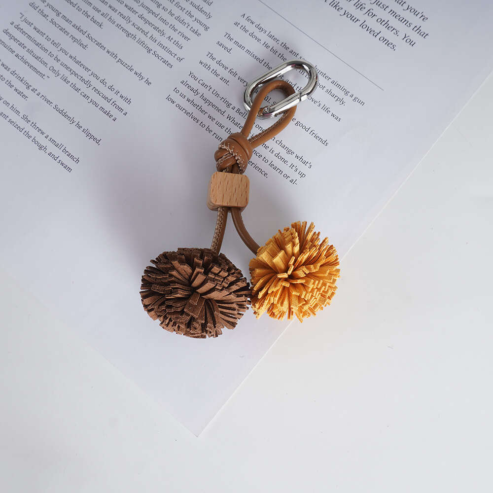 Miu Series Shoe Accessories High-End Mini Leather Handmade Woven Tassel Ball Keychain Bag Pendant