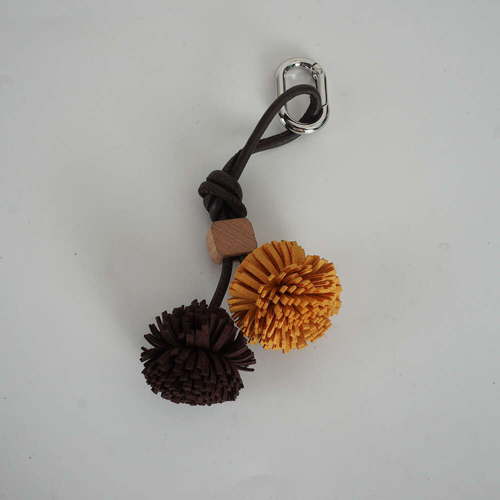 Miu Series Shoe Accessories High-End Mini Leather Handmade Woven Tassel Ball Keychain Bag Pendant