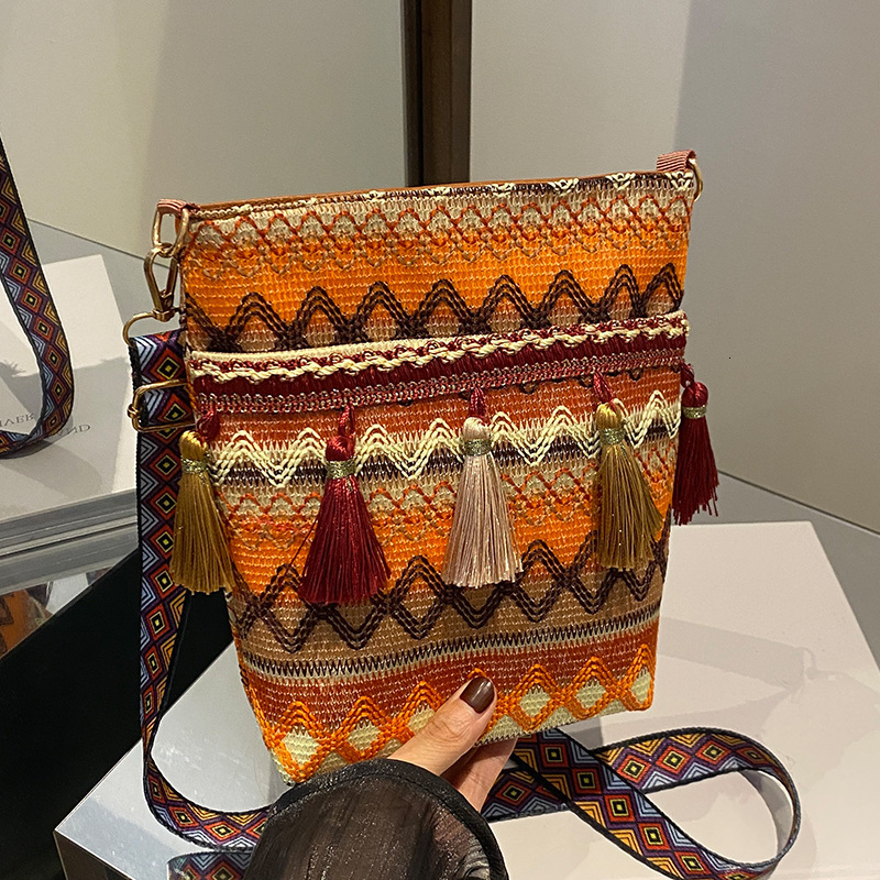Large fashion capacity ethnic style bag tassel single shoulder bucket bag designer bag retro commuting crossbody bag women s handbag