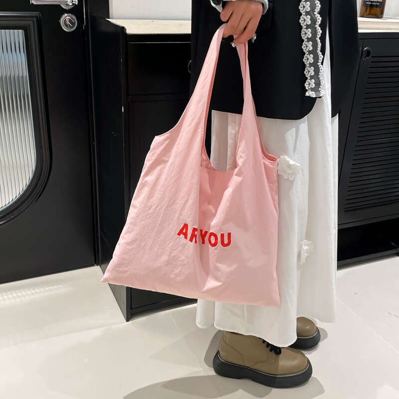 New Niche Alphabet Print Shoulder Large Capacity Designer Versatile Canvas Bag for Women Trendy Shopping Tote