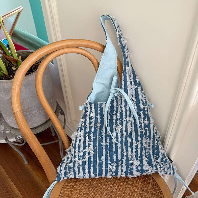 Spring New Dark Light Blue Striped Tassel Denim Fashion Versatile Design Sense Shoulder Bag for Work Commute