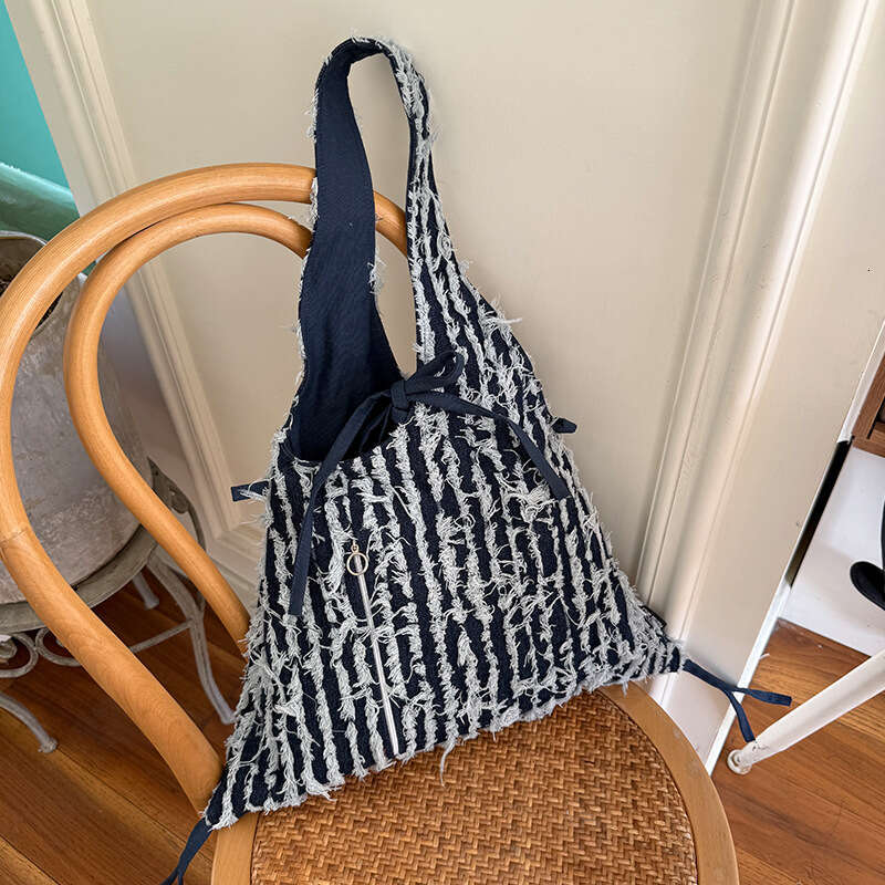 Spring New Dark Light Blue Striped Tassel Denim Fashion Versatile Design Sense Shoulder Bag for Work Commute