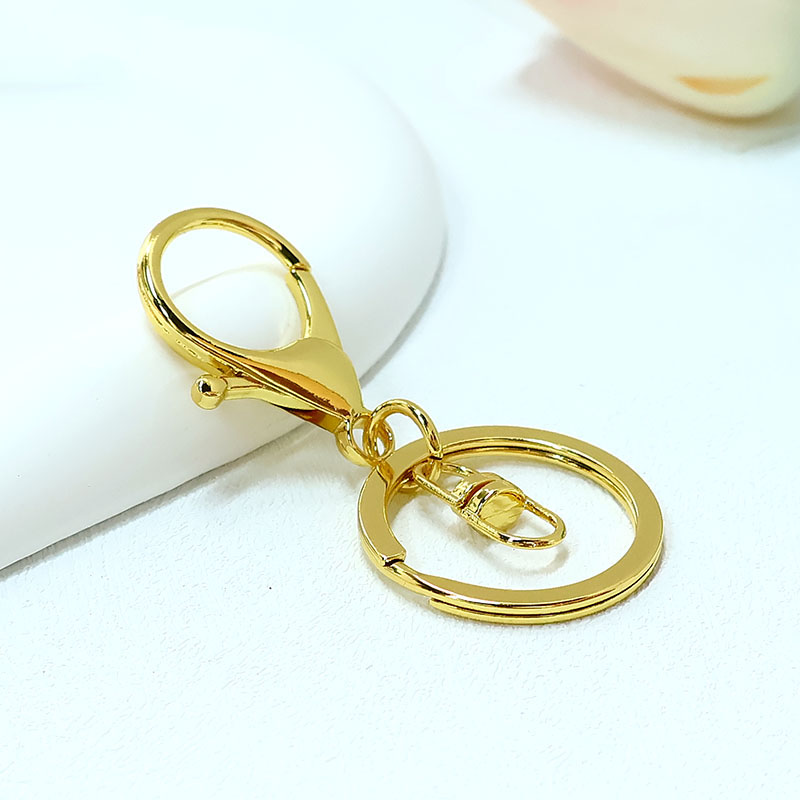 Zinc alloy lobster buckle bag hanging buckle keychain accessories DIY creative cartoon doll gift keychain gold color