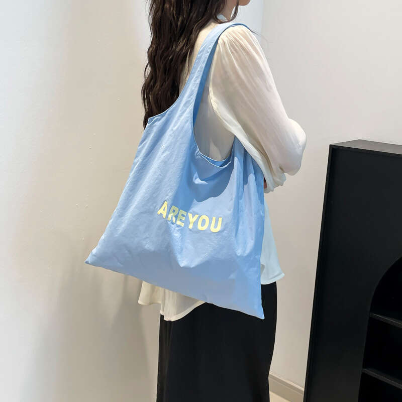 New Niche Alphabet Print Shoulder Large Capacity Designer Versatile Canvas Bag for Women Trendy Shopping Tote